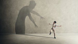 Shadow scaring a man